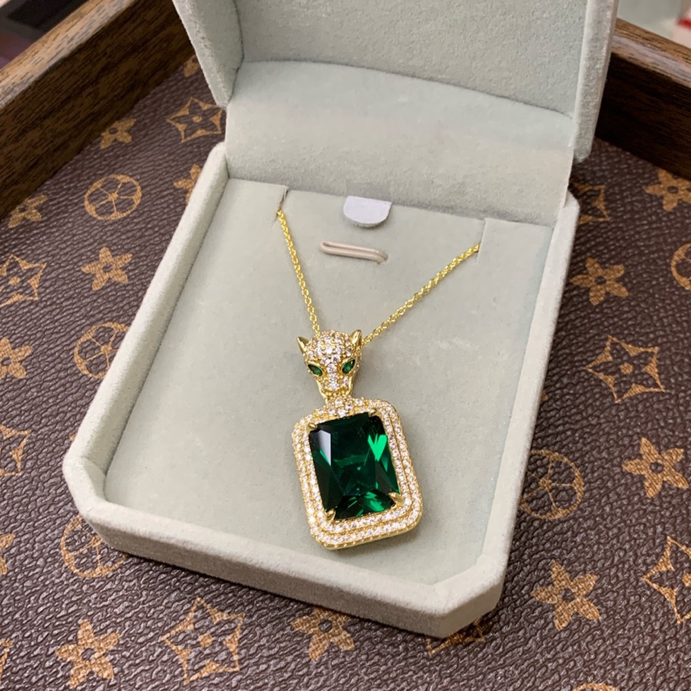 #172 necklace deep green gemstone with leopard head